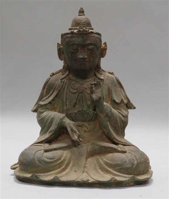 A Ming style bronze figure of a Buddha